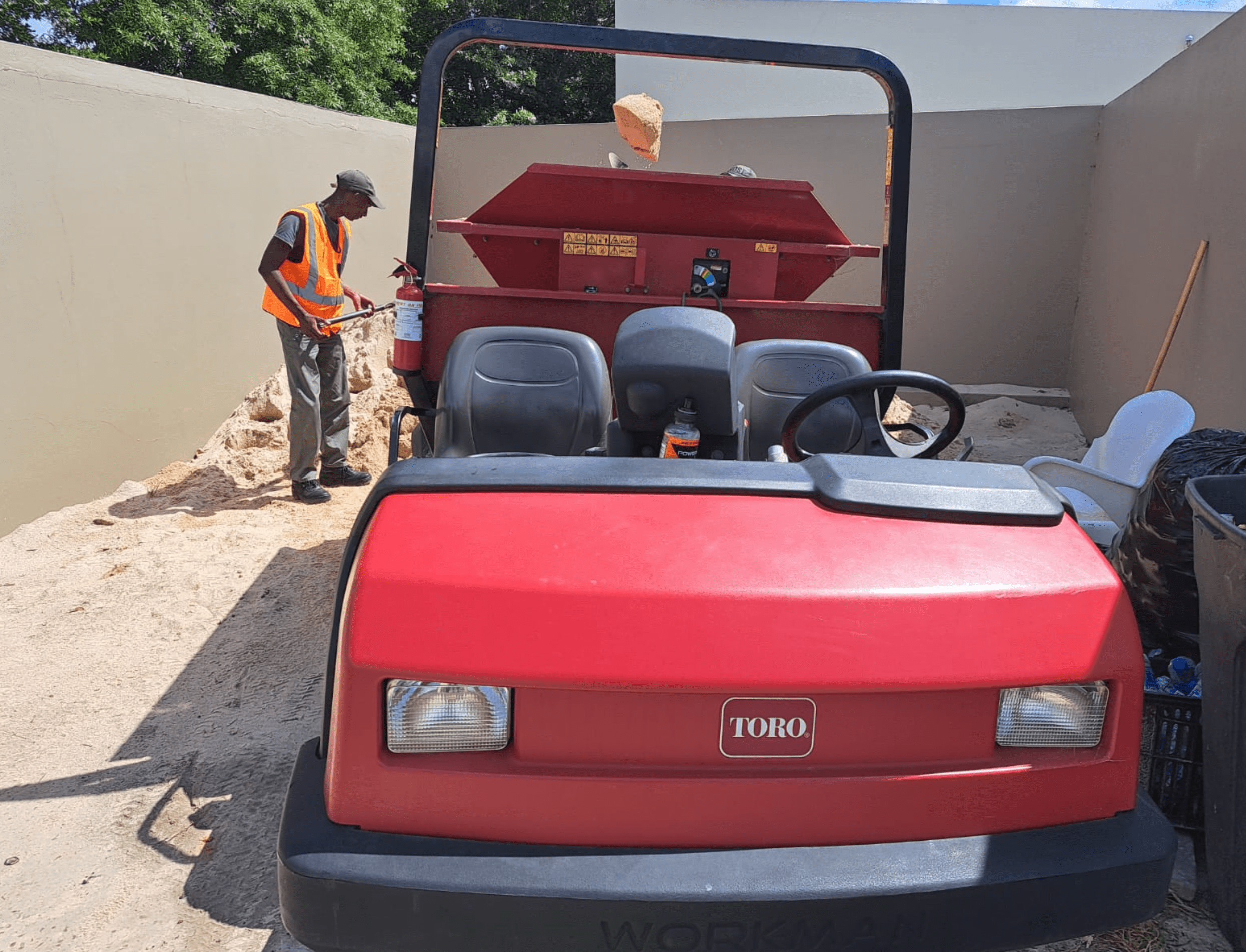 Toro 3300 Workman for spreading sand and spraying chemicals